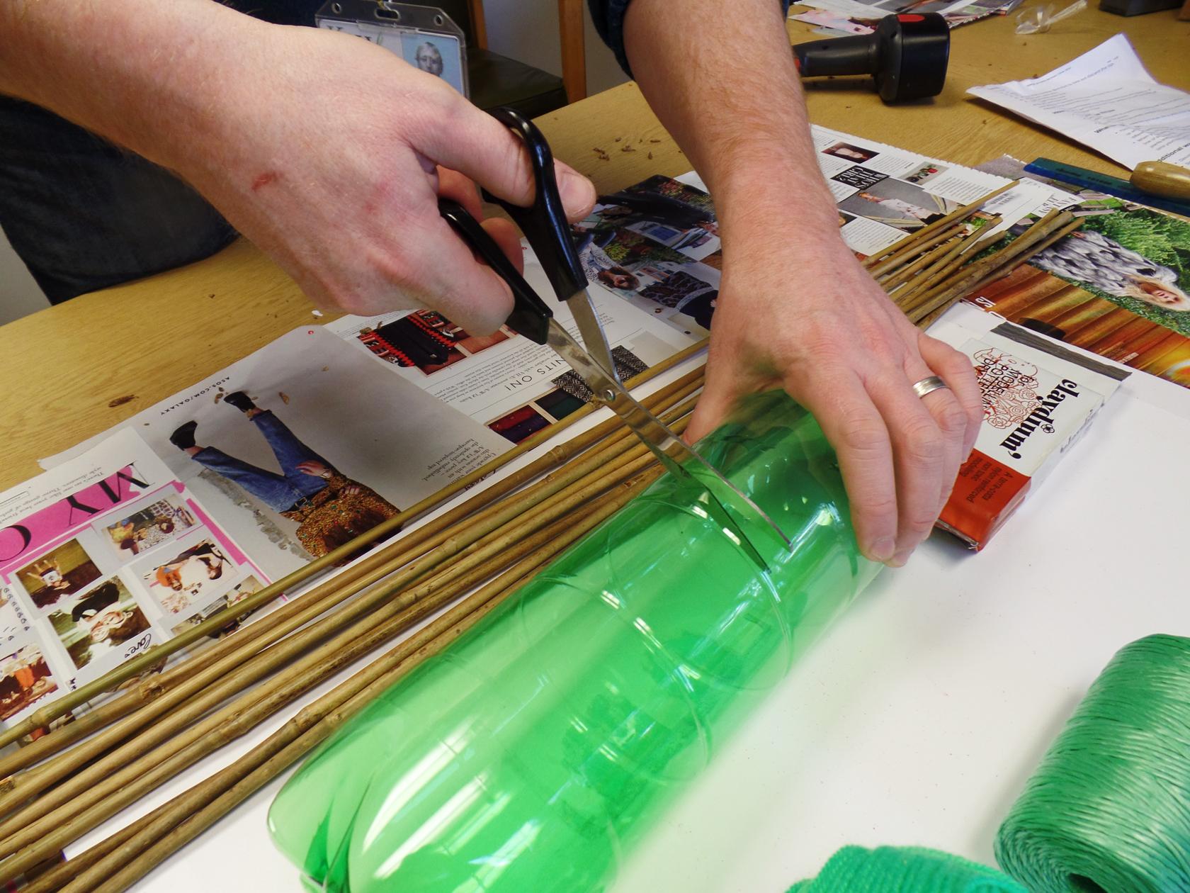 Cutting off the top of a plastic bottle
